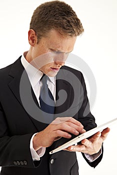 Businessman using touch screen tablet computer