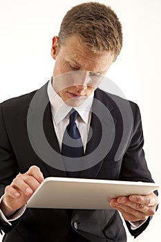 Businessman using touch screen tablet computer