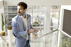 Businessman using touchscreen tablet