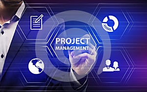 Businessman using virtual computer and selecting project management