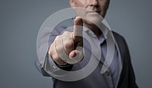 Businessman using a virtual interface and pointing