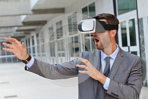 Businessman using virtual reality glasses