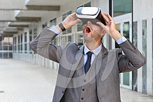 Businessman using virtual reality glasses