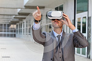 Businessman using virtual reality glasses