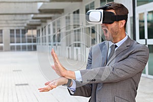 Businessman using virtual reality glasses