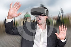Businessman using virtual reality headset glasses