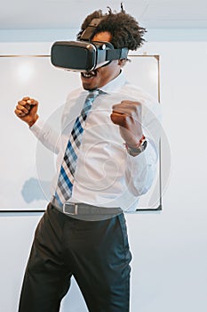 Businessman using virtual reality headset