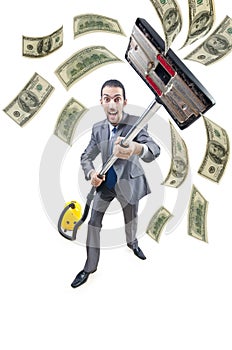 Businessman with vacuum cleaner