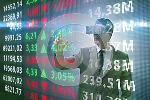 The businessman in virtual reality trading on stock market