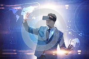 The businessman in virtual reality trading on stock market