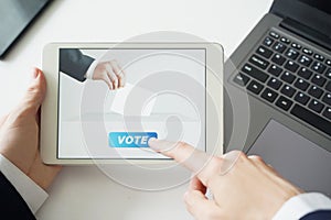 Businessman Voting Online by Digital Tablet