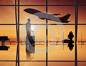 Businessman Waiting In An Airport Lounge.