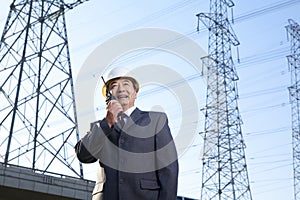 Businessman on Walkie Talkie