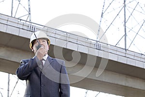 Businessman on Walkie Talkie