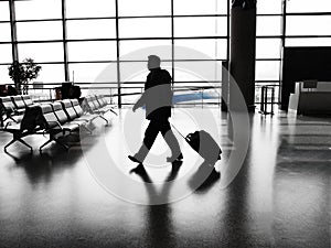Businessman walking in airport
