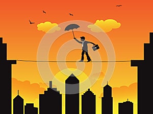 Businessman walking a high wire tightrope