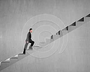 Businessman walking on stairs