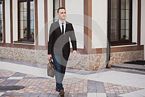 Businessman walking on the street