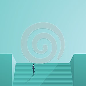 Businessman walking to top of stairs as a symbol of business success career, leadership, management.