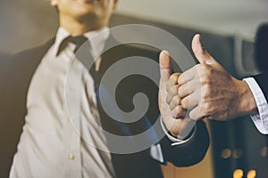 Businessman was given a thumbs-up and compliments from his boss