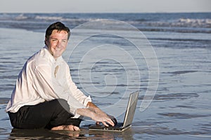 Businessman in Water at Beach
