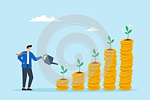 Businessman watering young plants growing on stack of coins