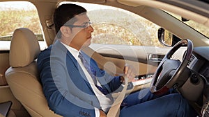 Businessman wear a seatbelt