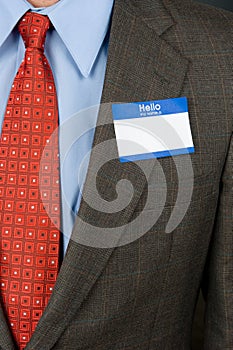 Businessman wearing blank nametag