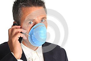 Businessman wearing a flu mask