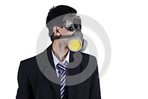 Businessman wearing gas mask isolated