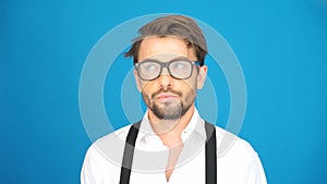 Businessman wearing glasses looking arround