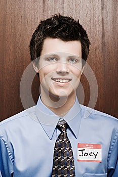 Businessman wearing name tag