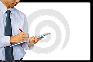 Businessman wearing suit writing on notepad and white background