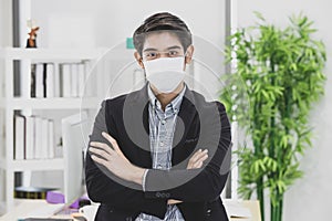Businessman wearing surgical mask