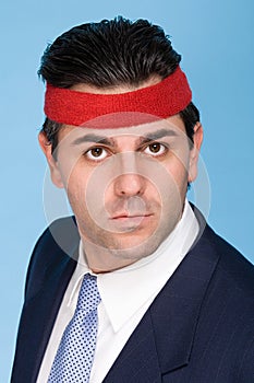 Businessman wearing a sweatband photo