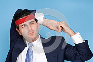 Businessman wearing a sweatband photo