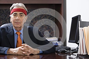 Businessman wearing a sweatband