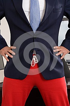 Businessman wearing tracksuit bottoms photo