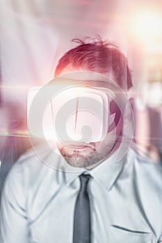 Businessman wearing virtual reality glasses