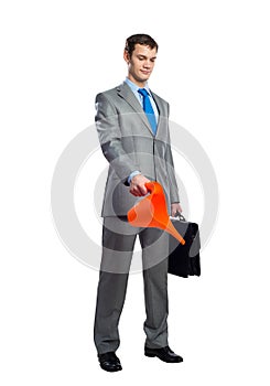 Businessman wears grey suit and blue tie