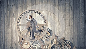 Businessman in wheel