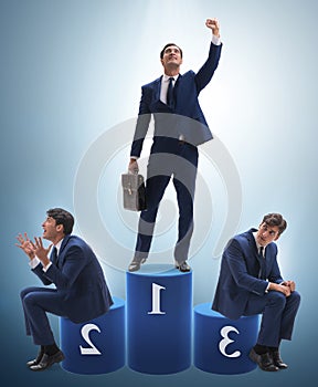 Businessman winning the first place in competition concept