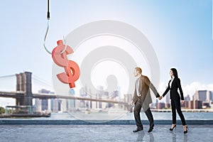 Businessman and woman with dollar sign