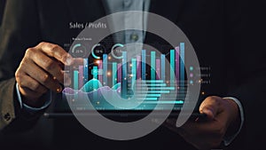 Businessman work with ai for economy analysis financial result by digital augmented reality graph. Concept for entrepreneur leader