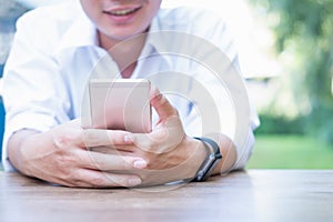 Businessman work with mobile phones in the office.working on int