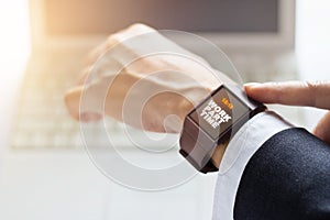 Businessman with work part time word on smartwatch screen