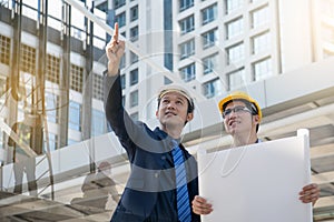 Businessman worker handshaking on construction site