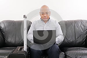 Businessman working in airport vip lounge