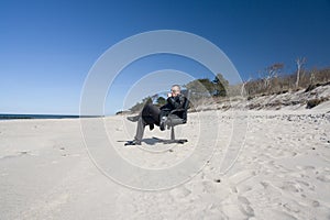 Businessman working from beach