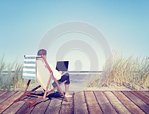 Businessman Working by the Beach